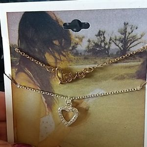 Two necklaces one love one heart